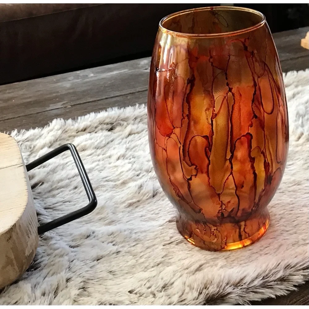 Hand crafted brown orange artisan glass vase painted with alcohol inks